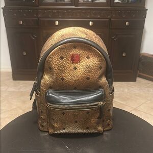 MCM Gold and Black Backpack
